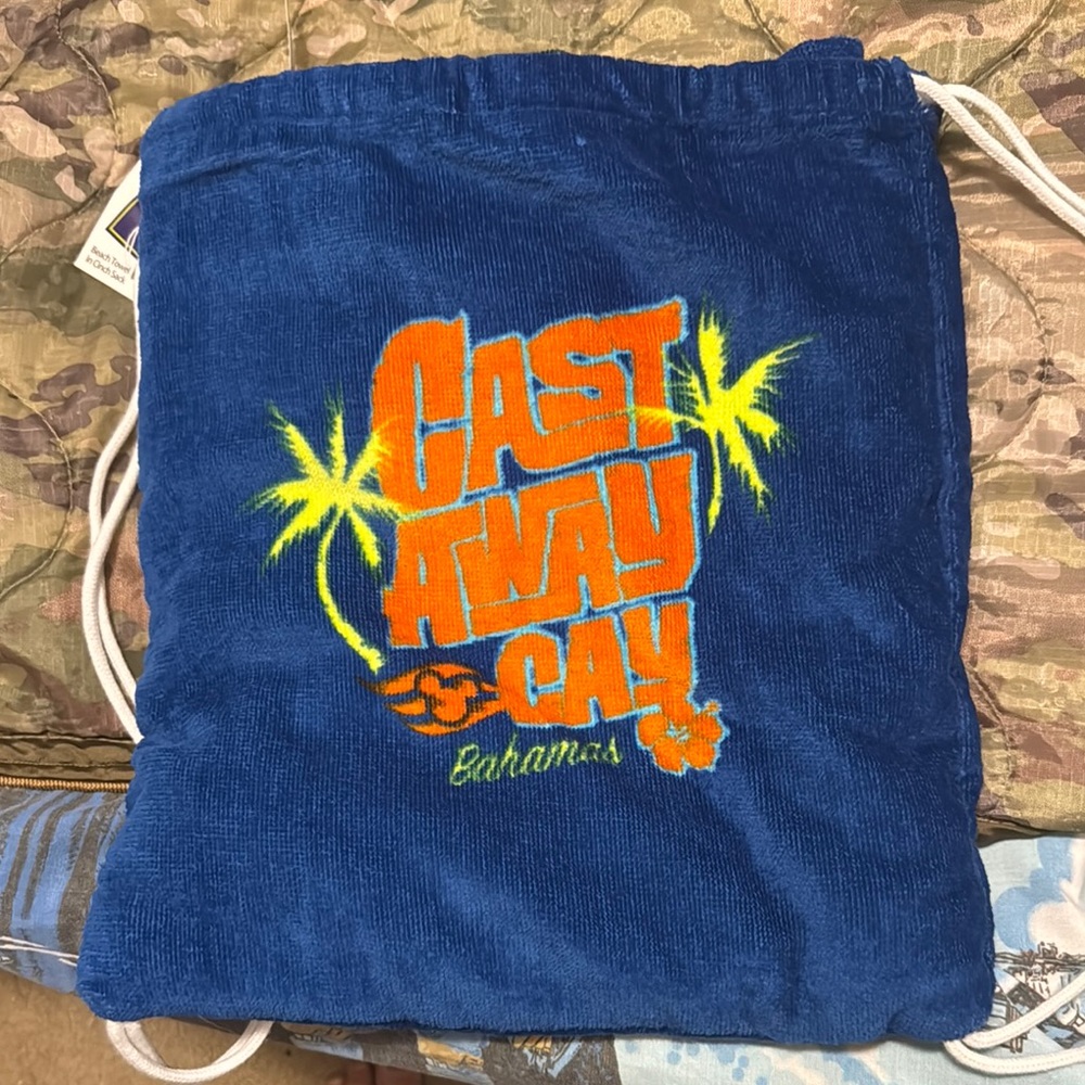 Blue Castaway Cay beach towel in a Drawstring Bag